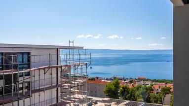 Makarska, two-bedroom apartment with garage parking space in a luxury new building with a pool