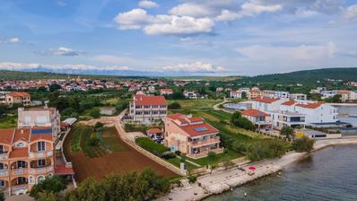 Sukosan, terreno edificabile esclusivo in prima fila al mare, vista mare