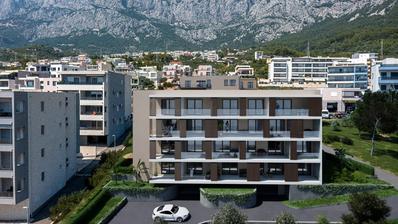 Makarska, ekskluzivni trosoban stan u novogradnji s vrtom i liftom