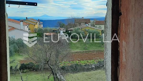 Istria, Puntera, casa de piedra para renovar con una hermosa vista a la isla de Cres.