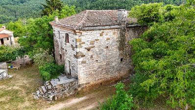 Istria, near Oprtalj - Authentic stone house with building land and outstanding potential