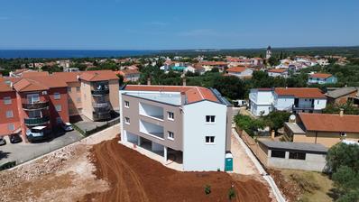 Istrie, Peroj, appartement moderne de deux chambres dans un nouveau bâtiment de qualité avec garage