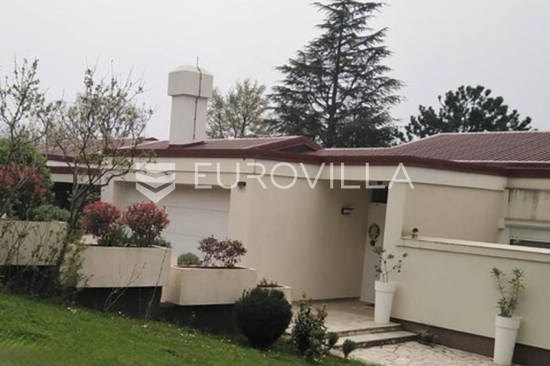 Krk, Njivice, house with a beautiful garden, 450 m from the sea.