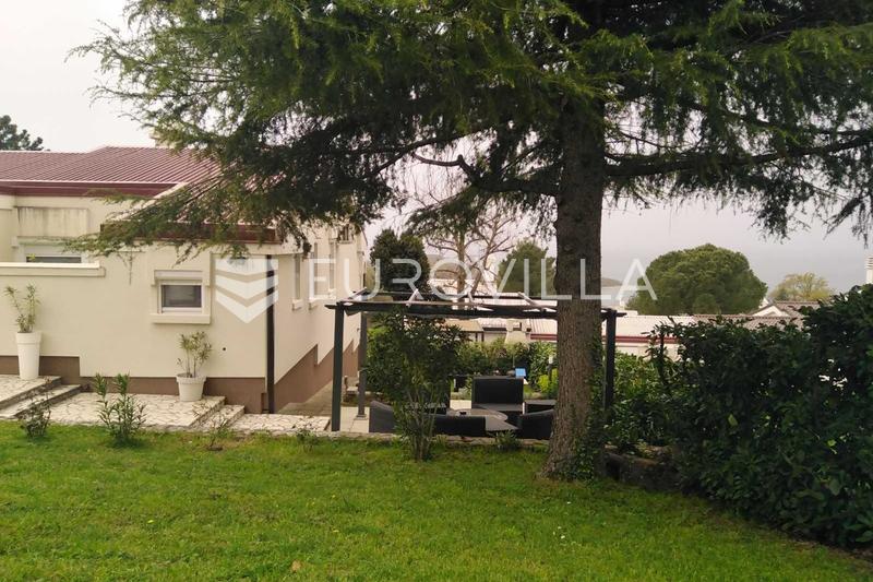 Krk, Njivice, house with a beautiful garden, 450 m from the sea.