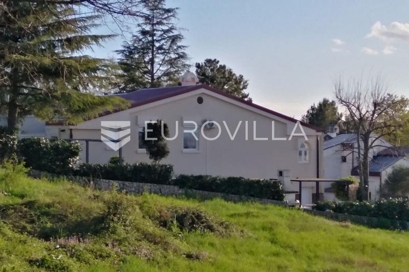 Krk, Njivice, house with a beautiful garden, 450 m from the sea.