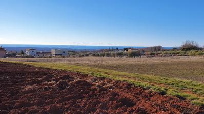 Istra, Poreč okolica – zemljište 1019 m2 s pogledom na more i građevinskom dozvolom